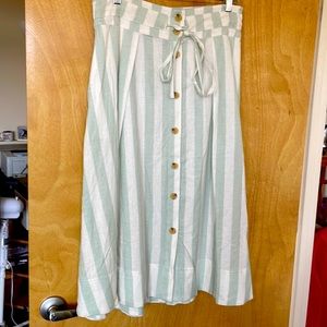 Beautiful skirt with light green stripes.